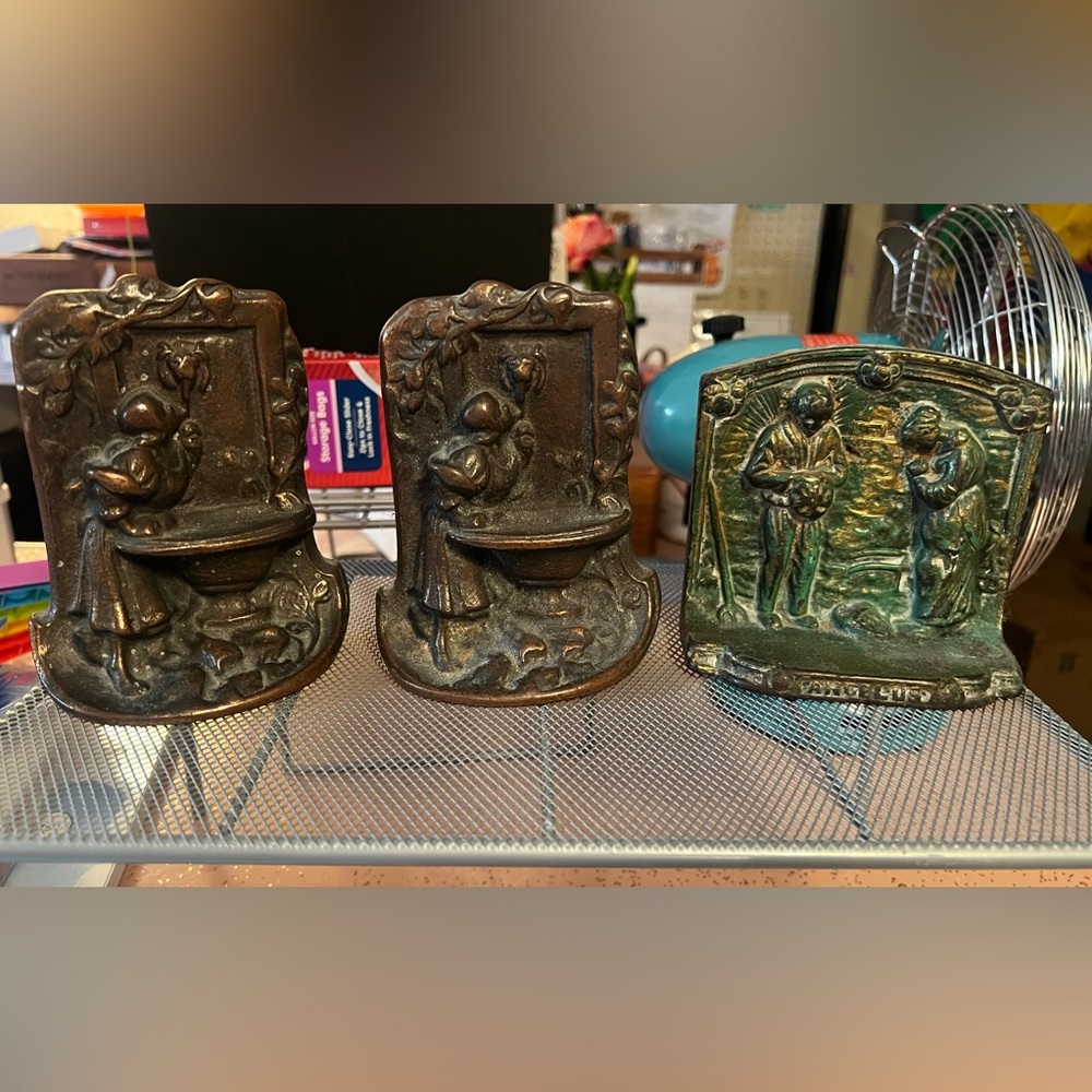 Vintage 3 cast iron book ends or doorstops. antique. 2 are identical.